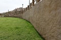 The entrance at ramp and green grass area at Al Qarah mountain resort area, at Land of civilization Royalty Free Stock Photo