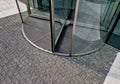 entrance revolving door with built-in mat. stainless steel frame.