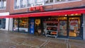 The entrance of a Rewe supermarket.