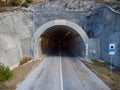 Entrance of road tunnel. Heading through the mountain, on the road. Royalty Free Stock Photo