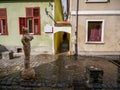 Entrance of the Rope street , one of the narrowest streets in Europe, focus on the sculpture wearing ropes.