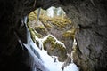 The entrance of Scarisoara ice cave in Apuseni mountain Royalty Free Stock Photo