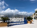 Tivat, Montenegro - 11 august 2023: Entrance sign against the background of the pier. Caption: Porto, Montenegro