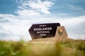 The entrance sign of Badlands national park in the evening during summer times , South Dakota, United States of America Royalty Free Stock Photo