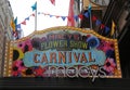 Entrance sign at the Macy`s Herald Square during `Carnival` theme flower decoration during famous Macy`s Annual Flower Show