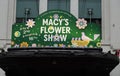 Entrance sign at the Macy`s Herald Square during famous Macy`s Annual Flower Show in midtown Manhattan