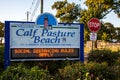 Entrance sign to Calf Pasture Beach in Norwalk about social distancing during COVID-19 virus