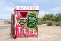 Entrance sign to Slab City, a lawless community out in the California desert with residents who