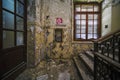 entrance with staircase in abandoned house