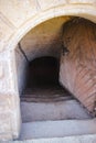 Entrance of the stairs to the mysterious dungeons of the castle Royalty Free Stock Photo