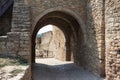 Entrance stone arched gate on Bilhorod-Dnistrovskyi fortress or Akkerman fortress (also known as Kokot). Royalty Free Stock Photo