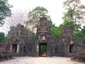 Entrance stone rock door gate ruin at Preah Khan temple Angkor Wat complex, Siem Reap Cambodia. A popular tourist attraction