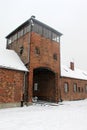 Entrance to Auschwitz camp, Poland. Snowing