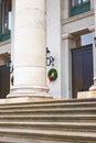 Entrance to Bavarian State Opera decorated with Christmas wreaths, Munich, Germany