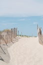 Entrance to a beach with wood fence Royalty Free Stock Photo