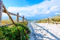 Entrance to beautiful sandy beach in Lubiatowo coastal village, Baltic Sea,