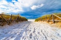 Entrance to beautiful sandy beach in Lubiatowo village, Baltic Sea