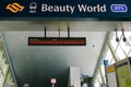 Entrance to Beauty World MRT Station; downtown line. Digital signage displaying Covid-19 advisory message