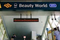 Entrance to Beauty World MRT Station; downtown line. Digital signage displaying Covid-19 advisory message
