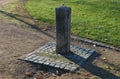 At the entrance to the bike path or the park, a large stone is placed in the middle of the road as a barrier against the car. next