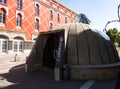 Entrance to Bunk`Art 2 Museum with Orange and Gold Facade of the Ministry of Urban Development in Tirana Albania