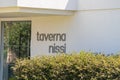 AGIA NAPA, CYPRUS - MAY 26, 2019: Entrance to the Taverna Nissi at the Nissi Beach, Ayia Napa