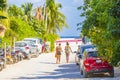 Entrance to caribbean coast beach with parked cars Tulum Mexico Royalty Free Stock Photo