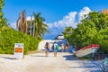 Entrance to caribbean coast beach with parked cars Tulum Mexico Royalty Free Stock Photo