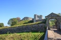 Entrance to Carisbrooke Castle with brick arch and walkway