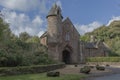 Entrance to a castle with round tower Royalty Free Stock Photo