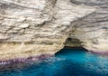 The entrance to the cave hidden in the rock.