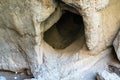 Entrance to a cave in the mountains of Armenia, close-up.