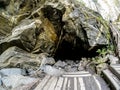 entrance to a cave in an old industrial excavation Royalty Free Stock Photo