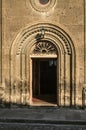 The entrance to the `Holy Sign` church in Gyumri is framed by oval stone patterned cornices. Royalty Free Stock Photo