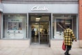 Entrance to Clarks Footware shoe store shop showing logo, sign, signage and branding