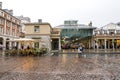 Entrance to Covent Garden historic markets from a square, London, United Kingdom Royalty Free Stock Photo