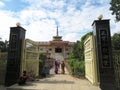 Visitors making their way into the Daijokyo Buddhist Temple, part of the Great Buddha Statue complex, Bodhgaya, India - Nov 2017