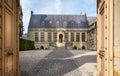 Entrance to famous archiepiscopal Palace of Tau in Reims, France