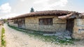 Entrance to the farmstead in the mountain village of Zheravna, Bulgaria Royalty Free Stock Photo