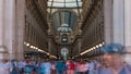 Entrance to the Galleria Vittorio Emanuele II timelapse on the Piazza del Duomo Cathedral Square . Royalty Free Stock Photo
