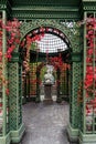 Entrance to a garden gazebo with Virginia creeper