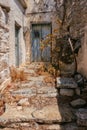 Entrance to a Greek house with a traditional blue door Royalty Free Stock Photo