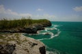 Entrance to Hatchet Bay from the cliffs above with blue sky and broken clouds