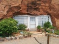 Entrance to Hole N` The Rock mountain home with soot over the door