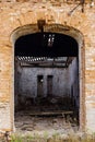 The entrance to the interior of an old abandoned industrial building