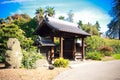 Entrance to Japanese Garden blue sky clouds trees