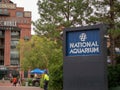 Entrance to the National Aquarium on the Baltimore Inner Harbor with Power Plant shopping plaza in background Royalty Free Stock Photo