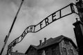 Entrance to the Nazi Concentration Camp at Auschwitz 1 showing the sign saying Arbeit Macht Frei Royalty Free Stock Photo