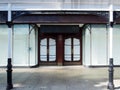 Entrance to an old abandoned abandoned store on lord street in southport, merseyside with empty shop front