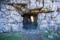 Entrance to the old destroyed second World War bunker. Cracked concrete with protruding reinforcing wires. Wegierska Gorka, South Royalty Free Stock Photo